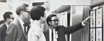 Club Chairman Koh Seow Chuan explaining an exhibit to Minister for Communications Mr. Yong Nyuk Lin